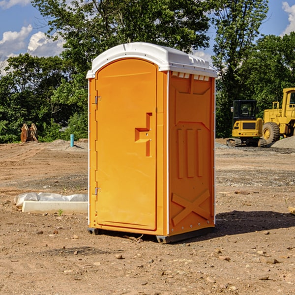 what is the cost difference between standard and deluxe portable restroom rentals in Powell